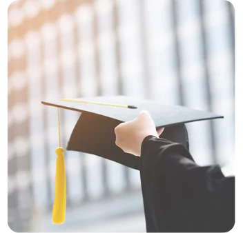 hand holding graduation cap